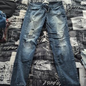 Distressed Blue Denim Jeans